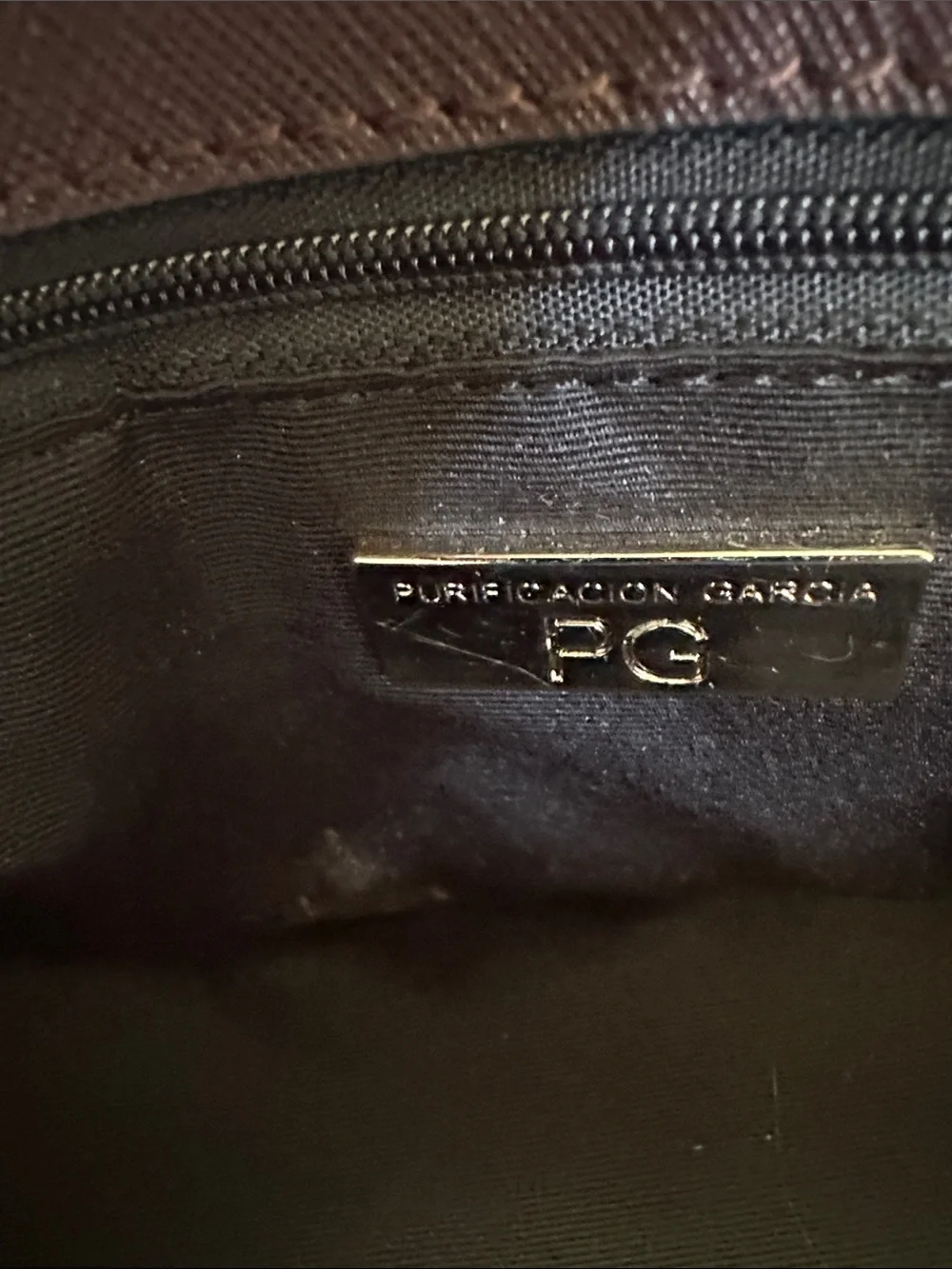 Beautiful Purificacion Garcia, Spanish brand. Structured maroon leather handbag.